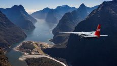 New Zealand Bike Tour South Island Escape flight into Milford Sound"