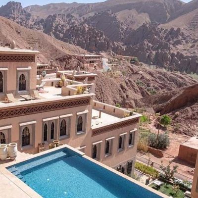 Eden Boutique Hotel, Morocco Infinity pool and red rock canyon views at the Eden Boutique Hotel in Morocco's Dades Gorge, an Othello tour accommodation