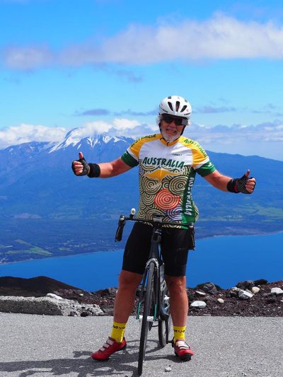 A wolf in Che clothing by Charlie Morgan Charlie on his bike having ridden to the top of volcano Osorno in Chile