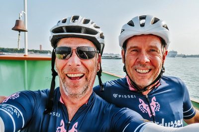 Our Lionheart Odyssey by Mich Jones Mitch and John on a boat in Venice before the Lionheart bike tour